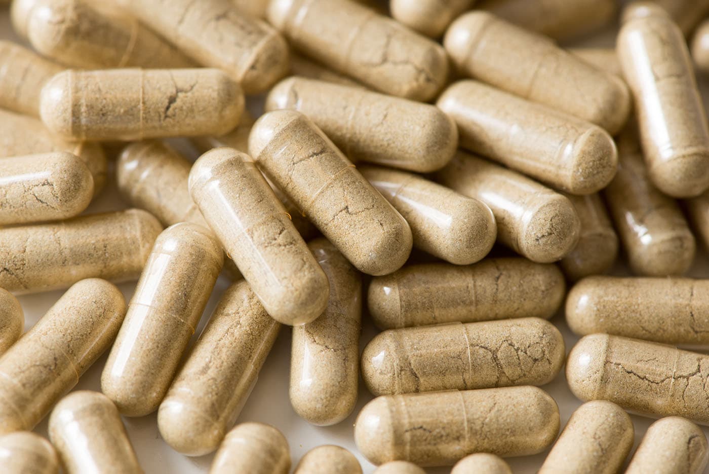 Powder-filled supplement capsules