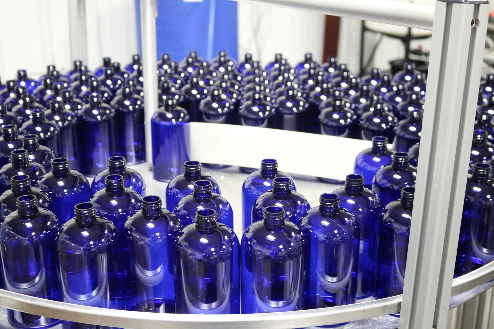 Liquid supplement bottles on the production line