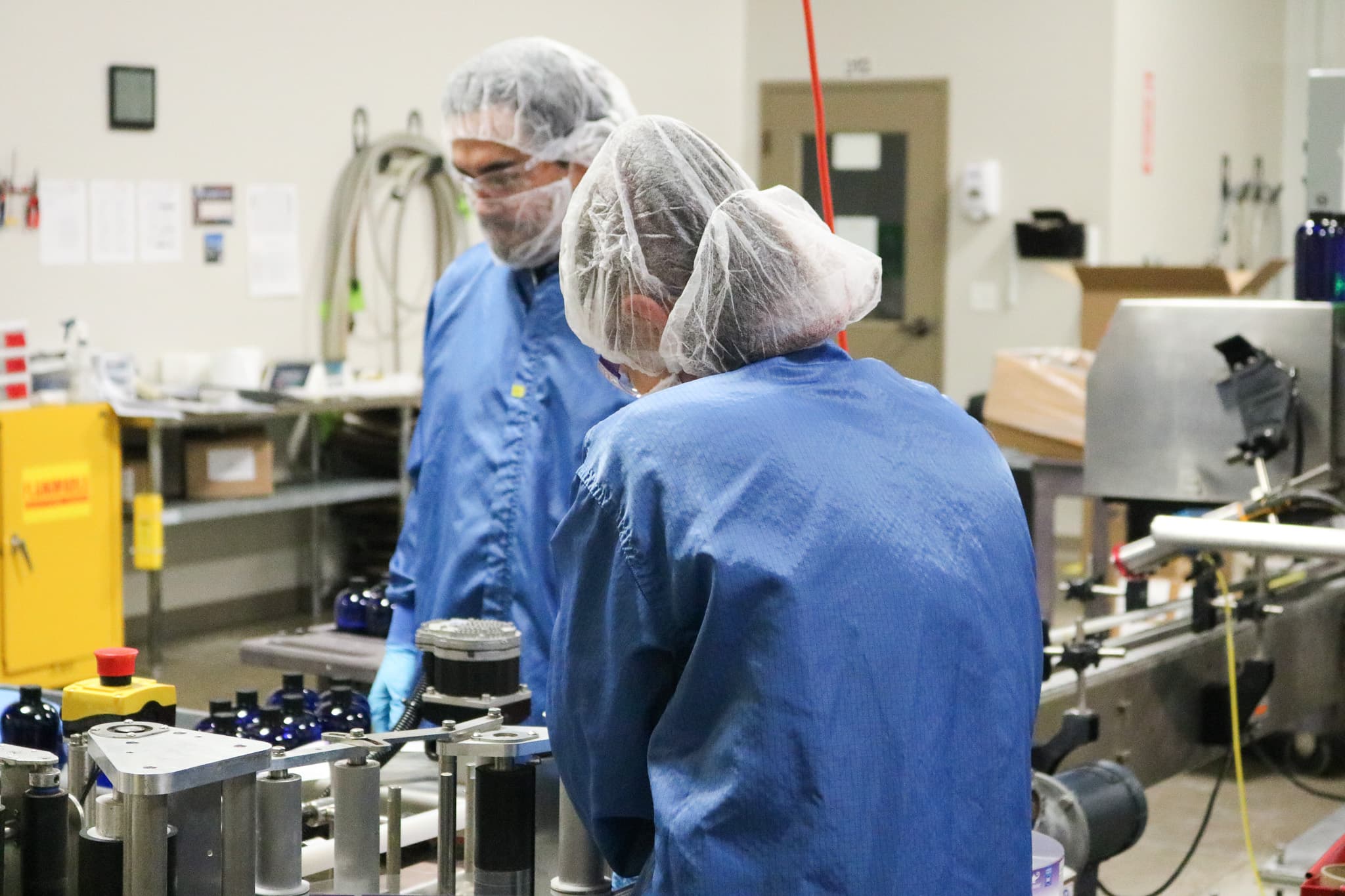 Mineralife team members working on the packaging line